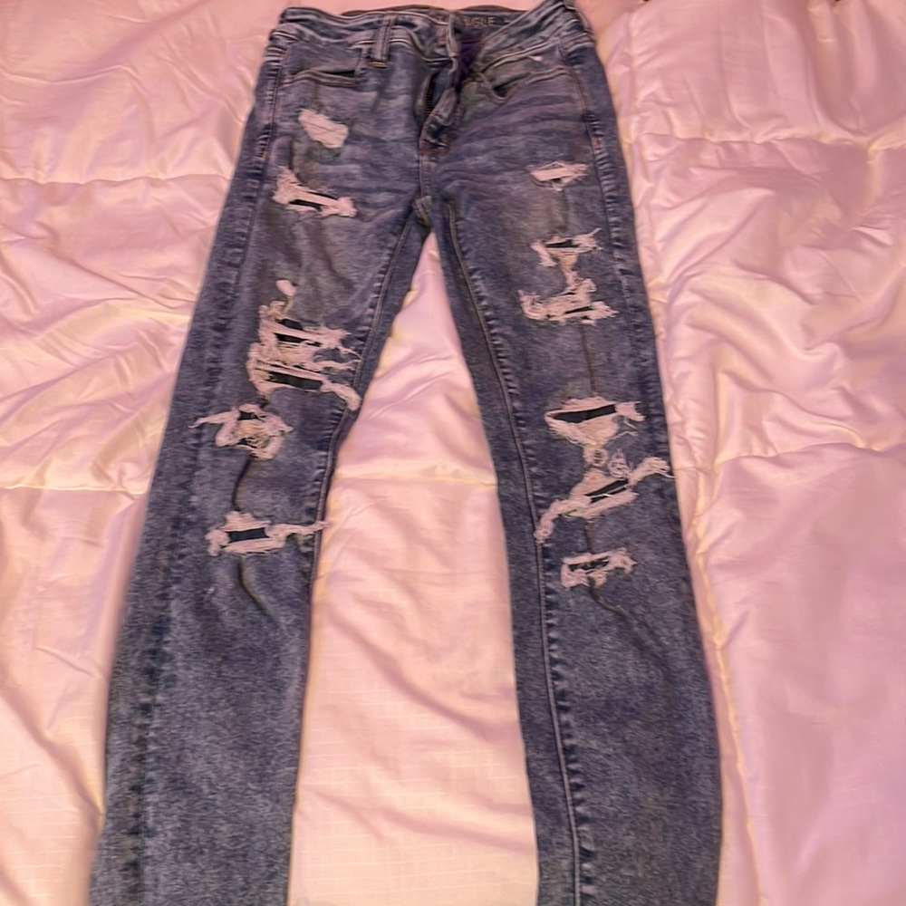 american eagle size 2 ripped jeans with patched back
